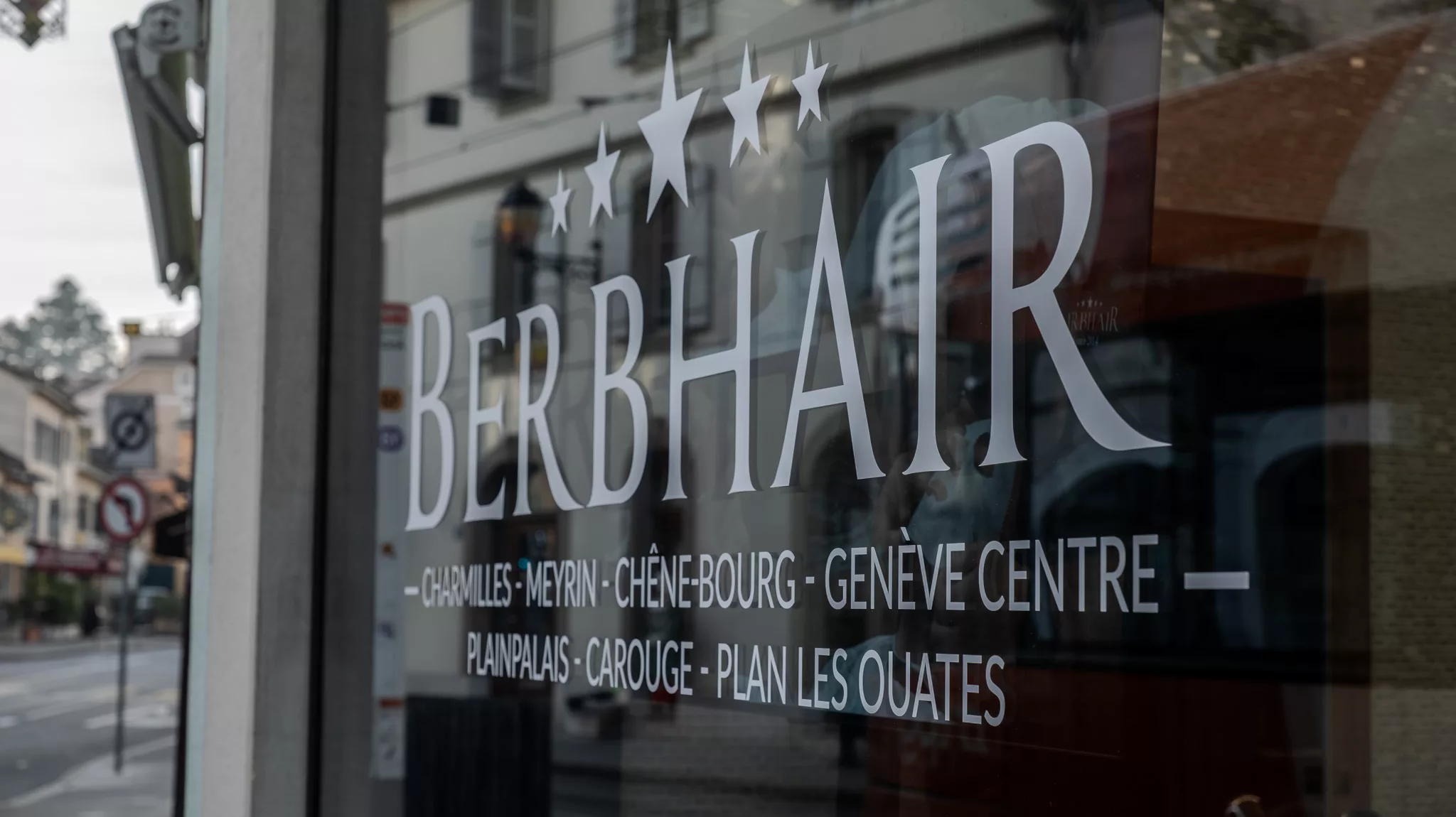 Salon barber carouge sign in Geneva, Switzerland